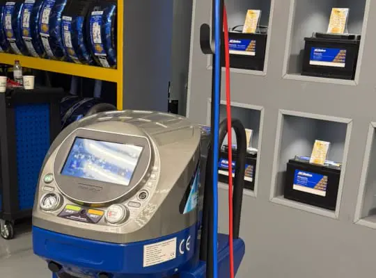 Genuine batteries and parts wall inside the workshop